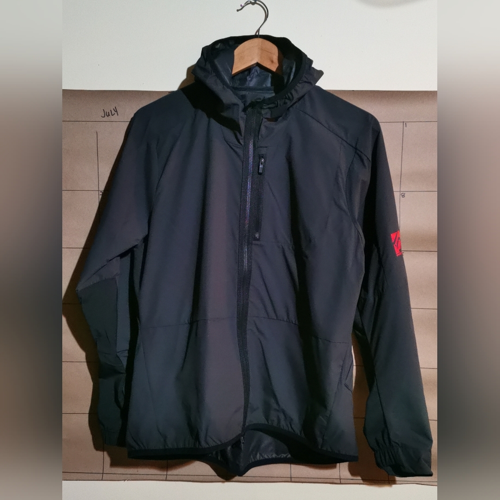 Brand new Woman's adidas five ten wind jacket - medium